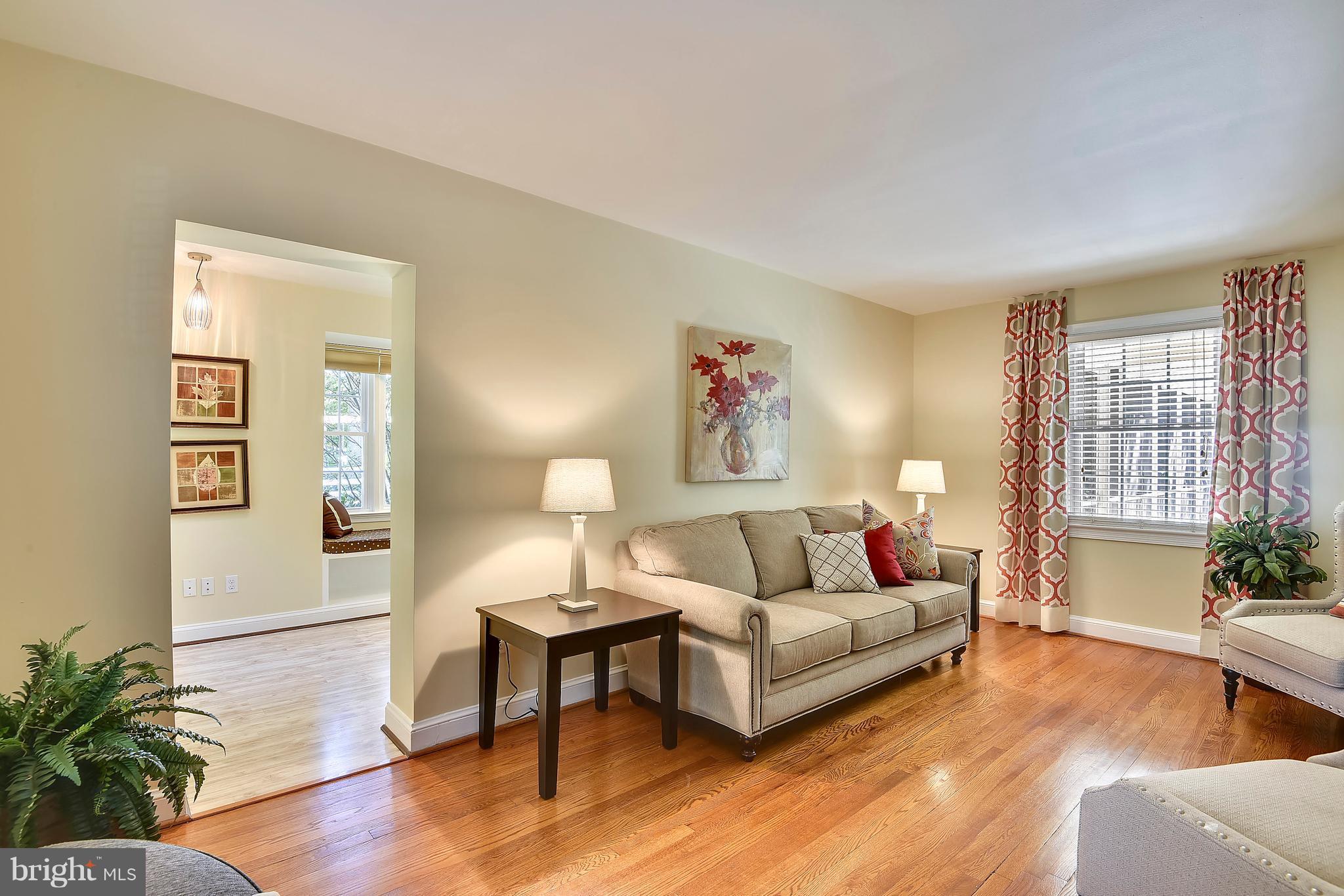 10001 Raynor Road Silver Spring, MD 20901 - Photo 3 of 30 a living room with furniture and a wooden floor