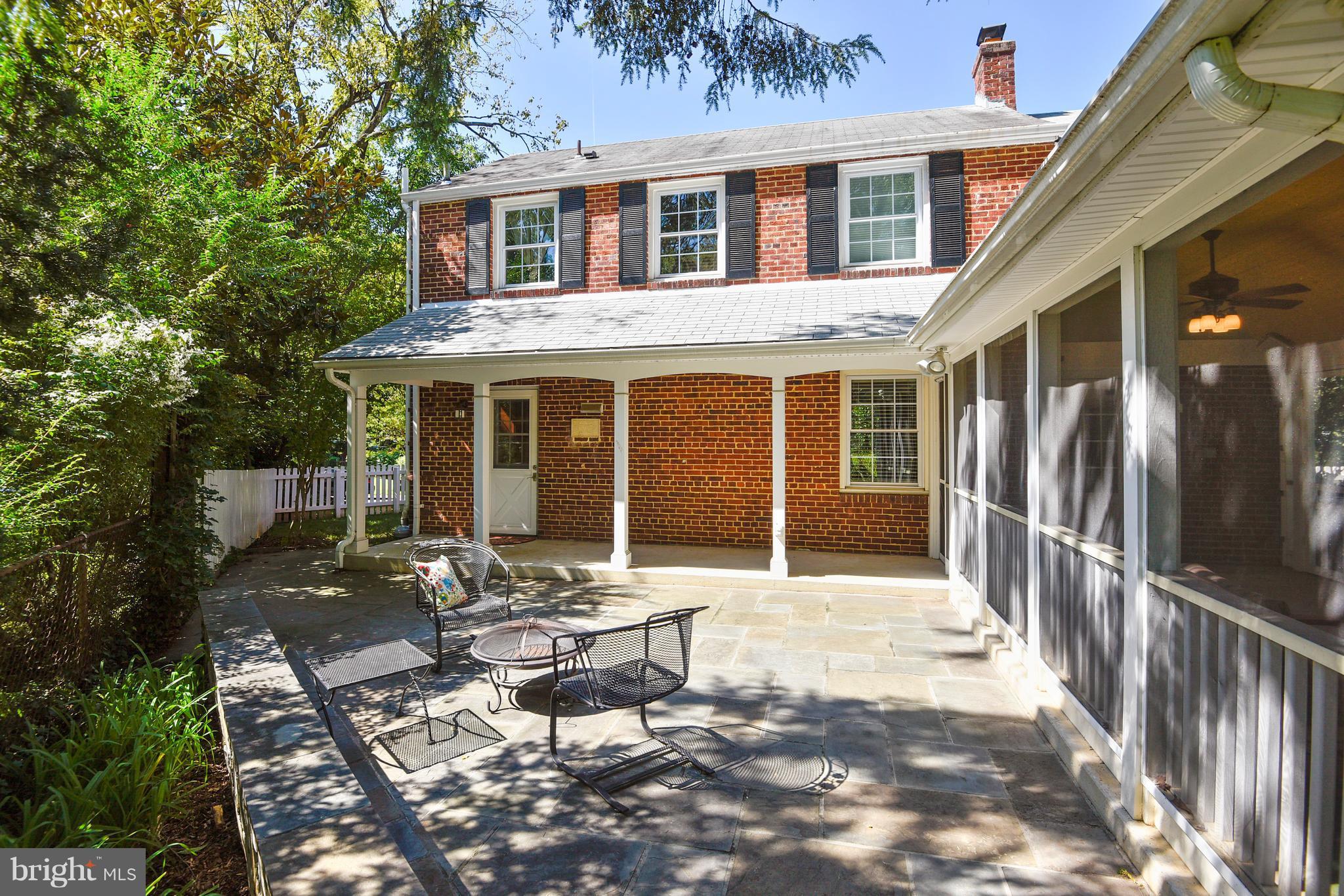 10001 Raynor Road Silver Spring, MD 20901 - Photo 21 of 30 a view of a house with backyard and sitting area