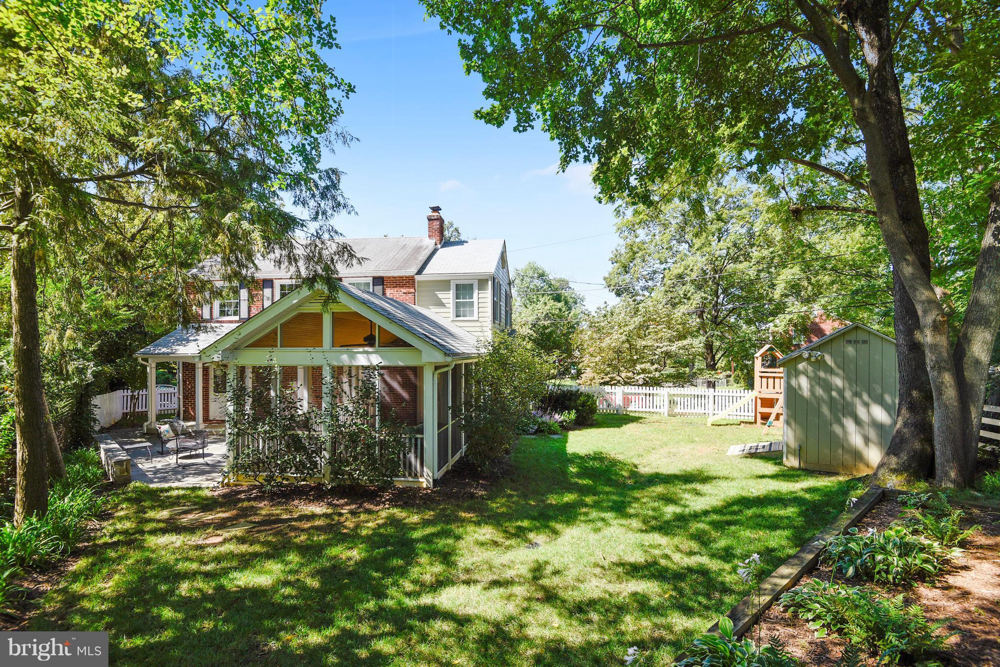 10001 Raynor Road Silver Spring, MD 20901 - Photo 24 of 30 a front view of a house with garden