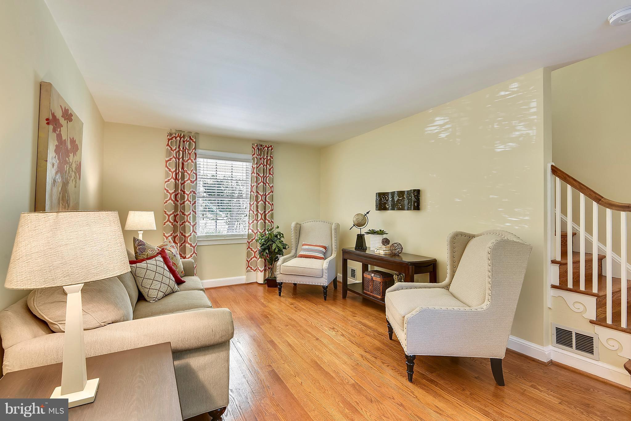 10001 Raynor Road Silver Spring, MD 20901 - Photo 4 of 30 a living room with furniture and a large window