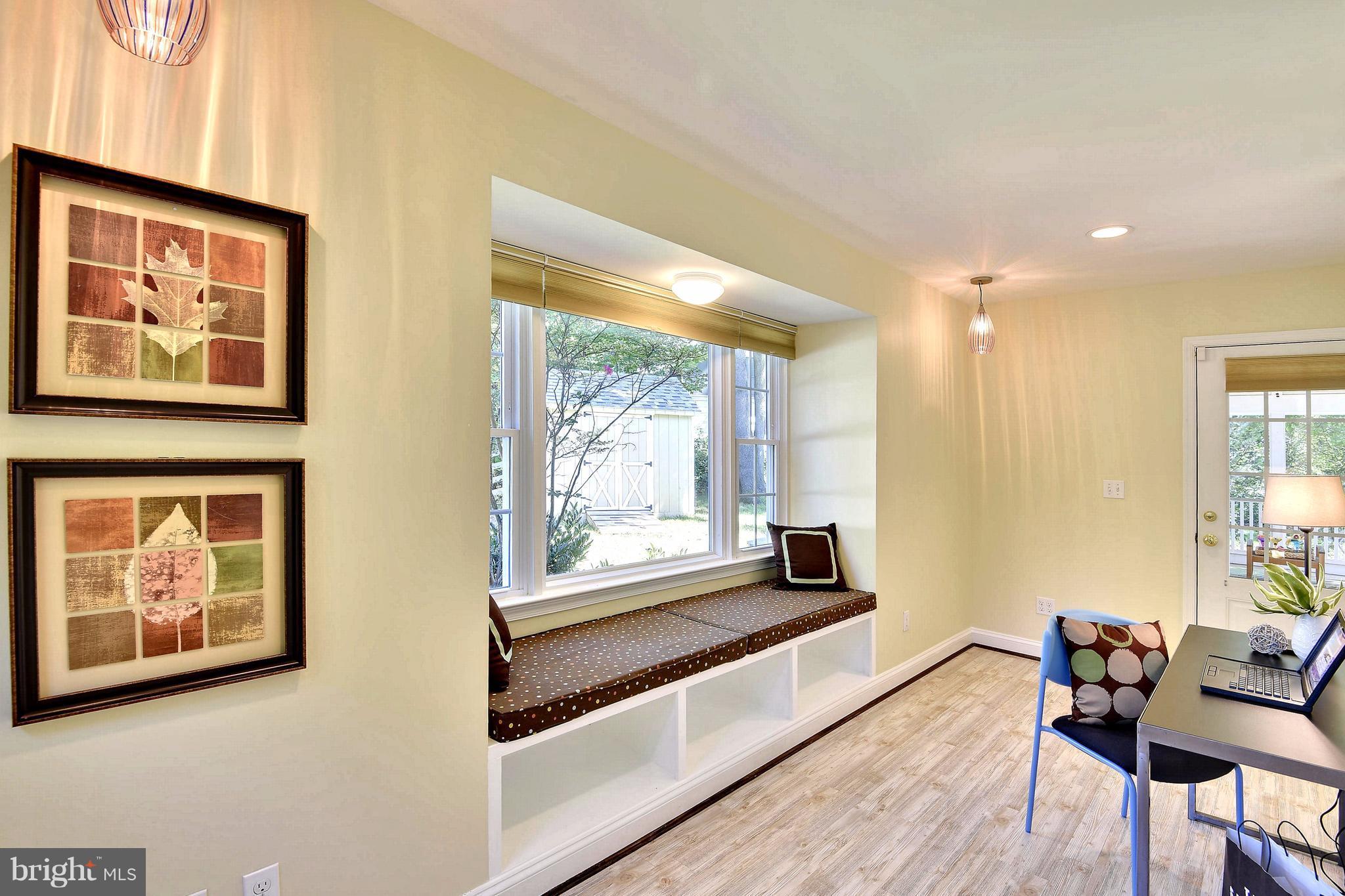10001 Raynor Road Silver Spring, MD 20901 - Photo 5 of 30 a living room with furniture and a large window