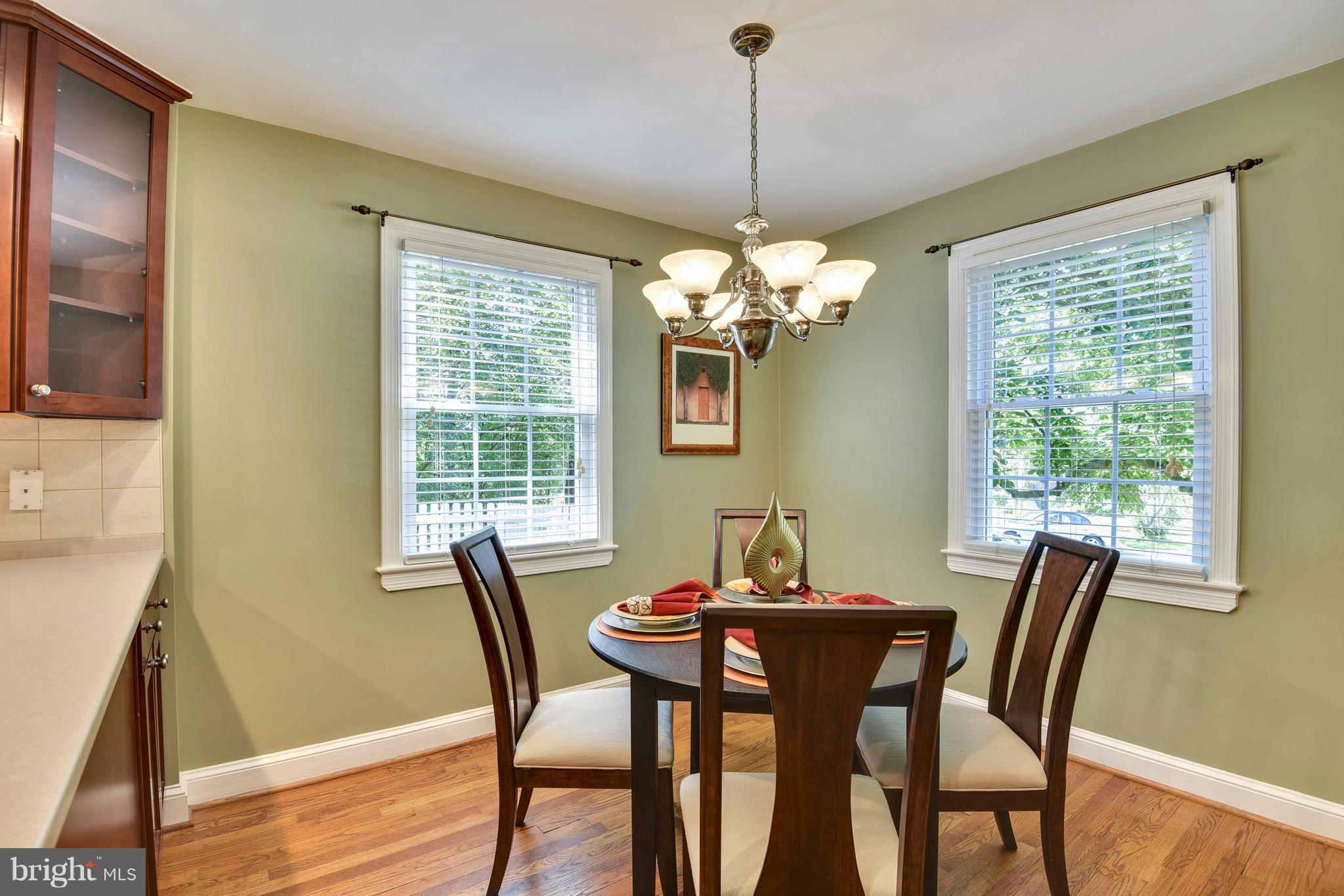 10001 Raynor Road Silver Spring, MD 20901 - Photo 8 of 30 a view of a dining room with furniture window and outside view