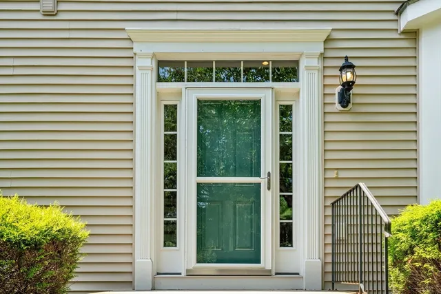 a view of a door and a window