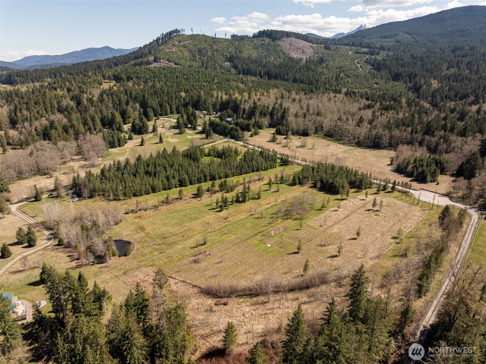 4890 Lost Mountain Road Sequim, WA 98382 - Photo 11 of 36 a view of a town with mountains