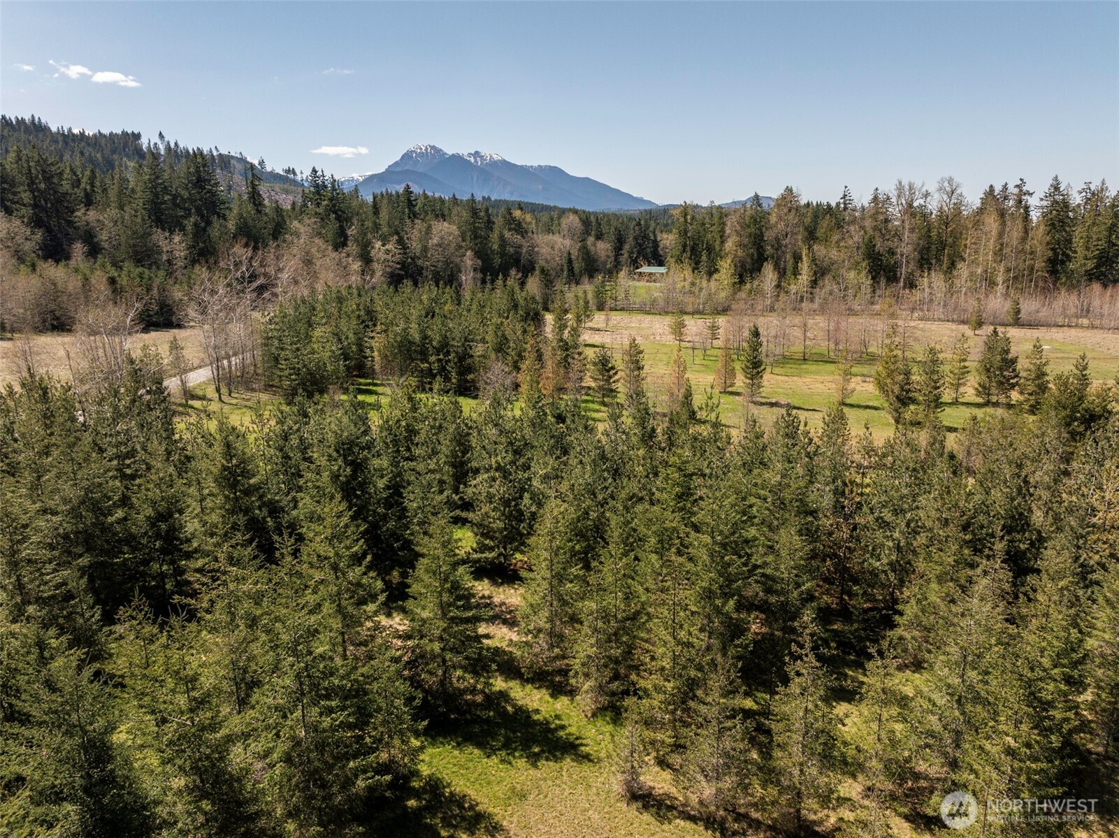 4890 Lost Mountain Road Sequim, WA 98382 - Photo 20 of 36 a view of mountain with lake in background