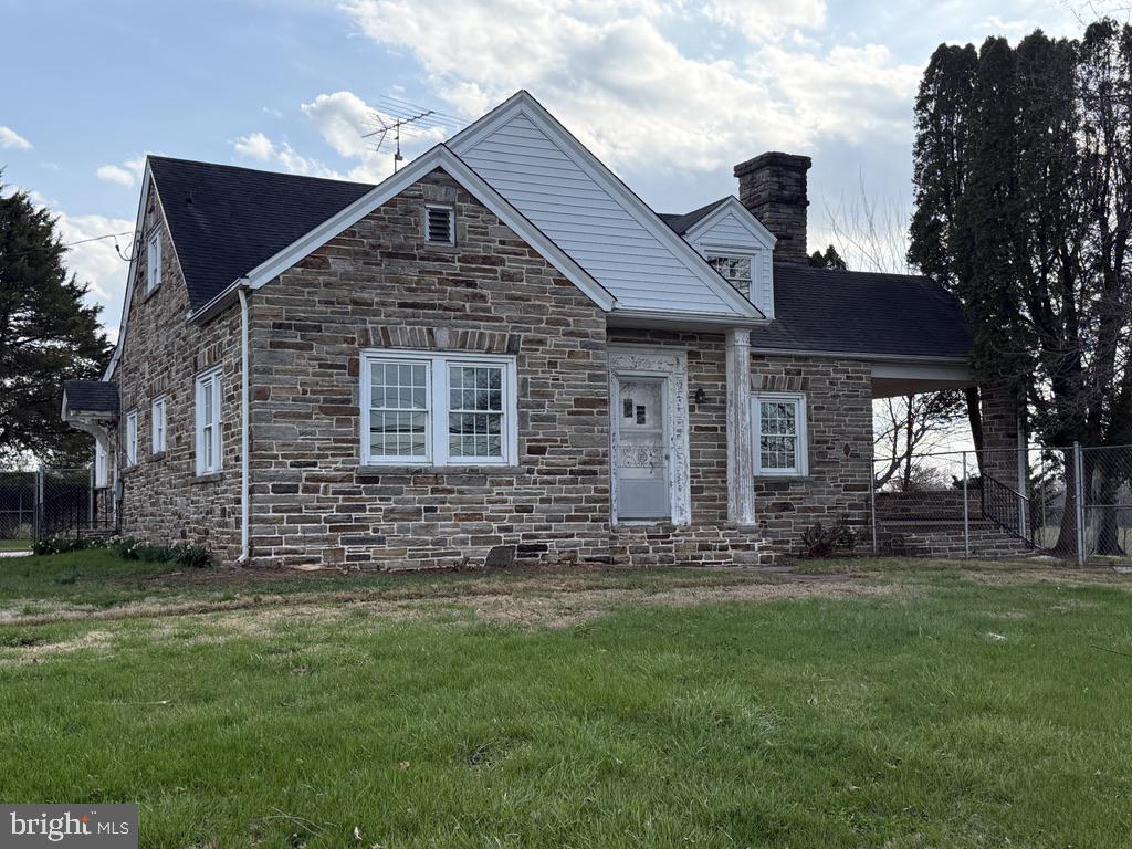 6245 Middleburg Road Keymar, MD 21757 - Photo 6 of 77 a front view of a house with a garden