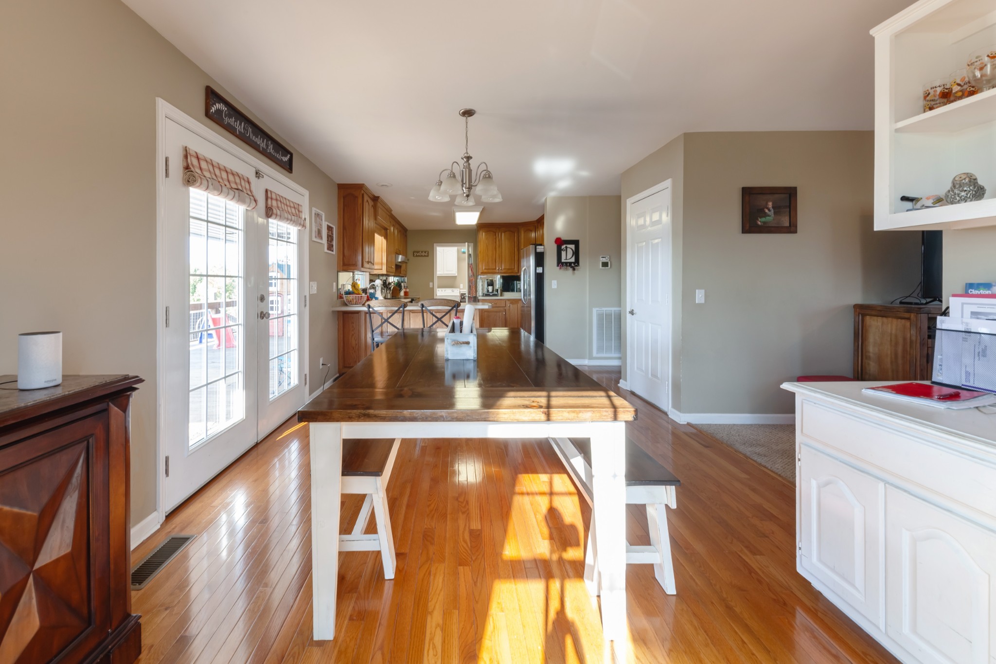 7055 Buford Station Road Lynnville, TN 38472 - Photo 12 of 34 a kitchen with a sink and wooden floor