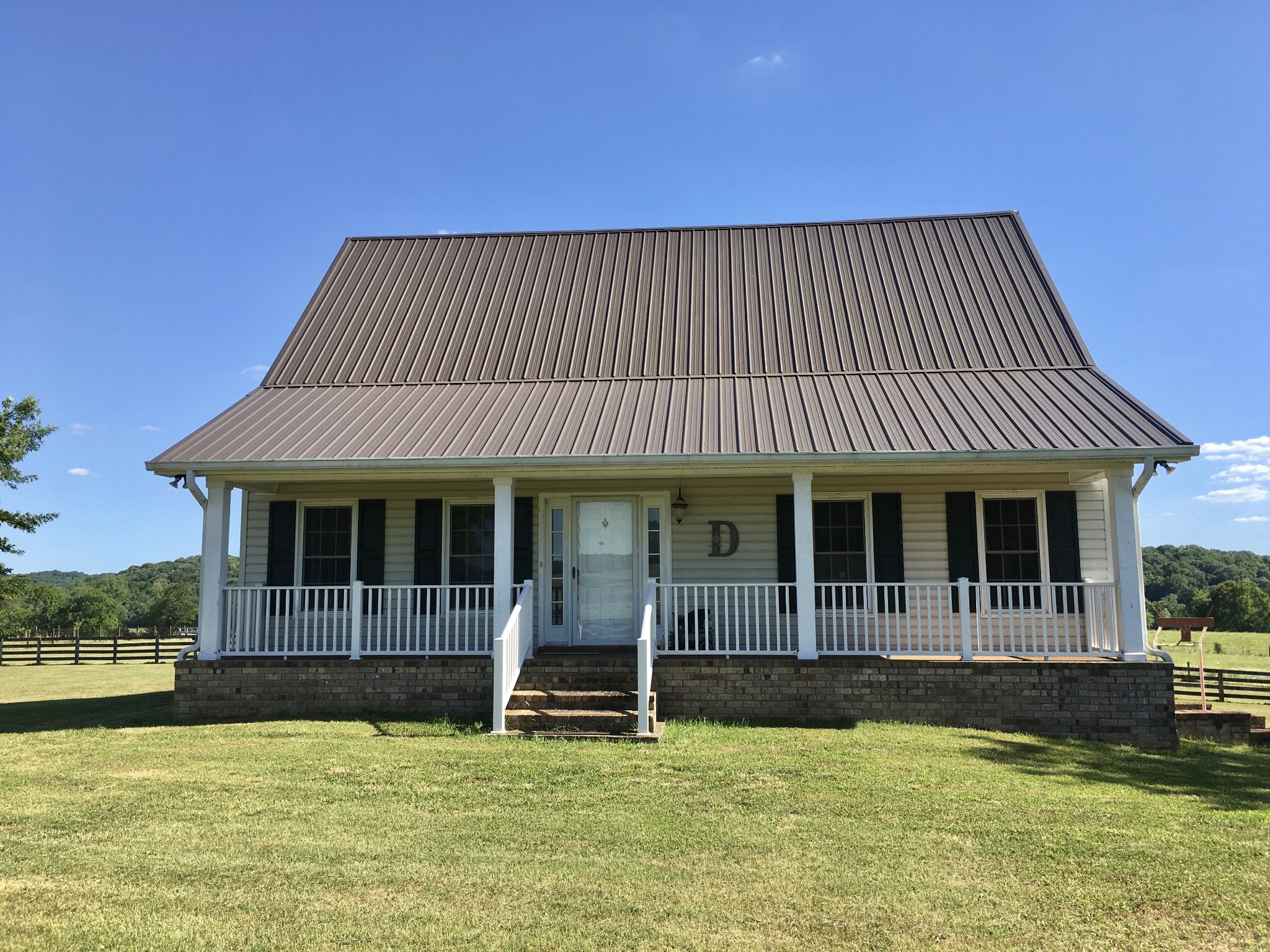 7055 Buford Station Road Lynnville, TN 38472 - Photo 5 of 34 a view of a house with swimming pool in front of it
