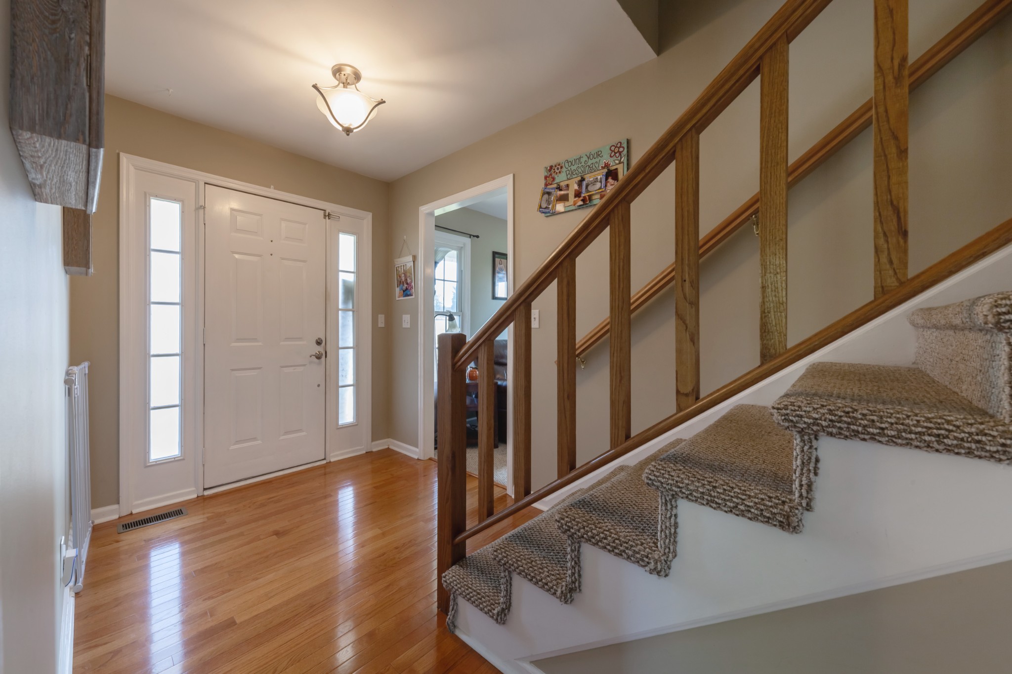 7055 Buford Station Road Lynnville, TN 38472 - Photo 8 of 34 a view of entryway and hall with wooden floor