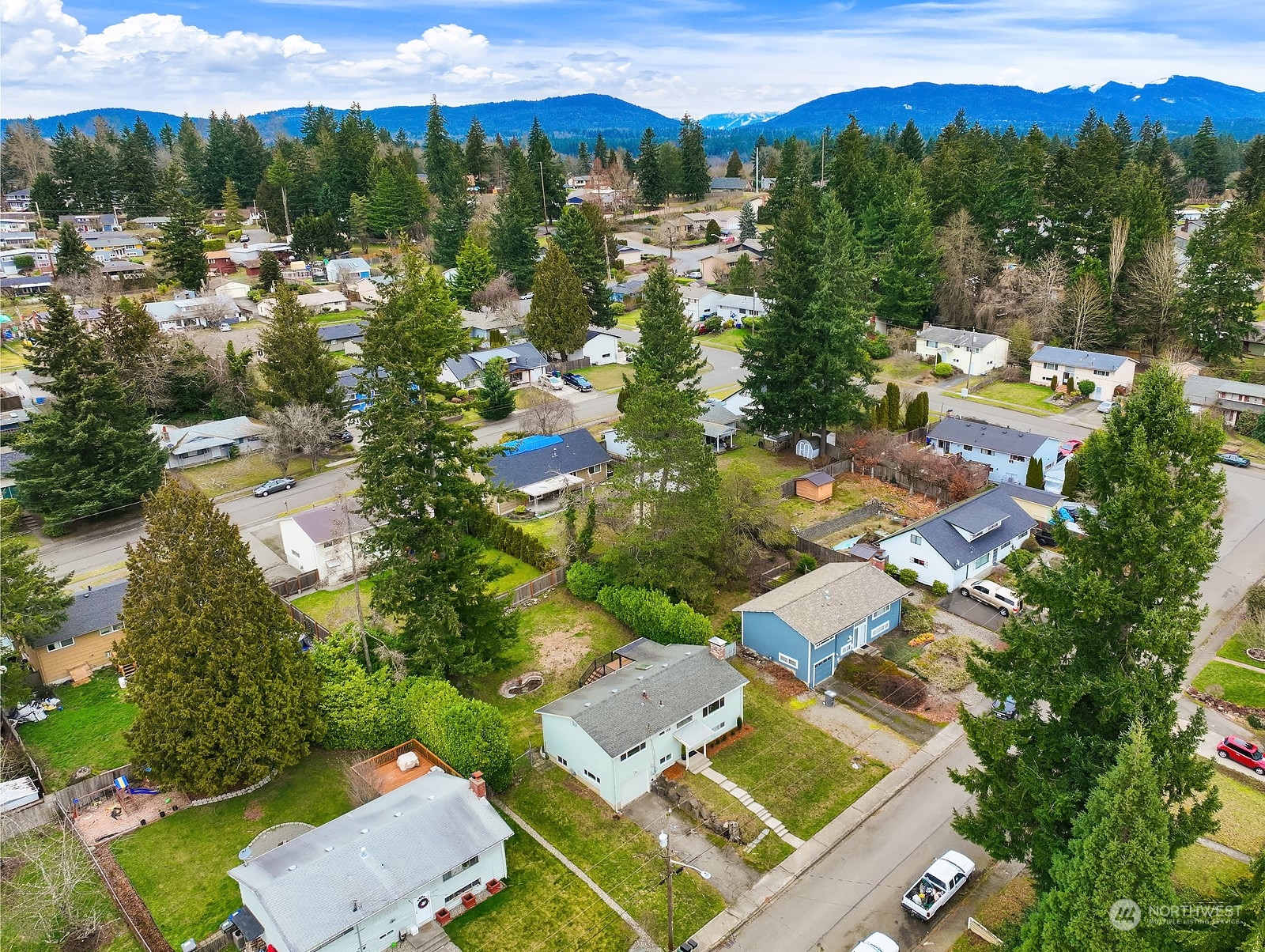 12728 Southeast 163rd Street Renton, WA 98058 - Photo 29 of 40 an aerial view of residential houses with outdoor space and parking