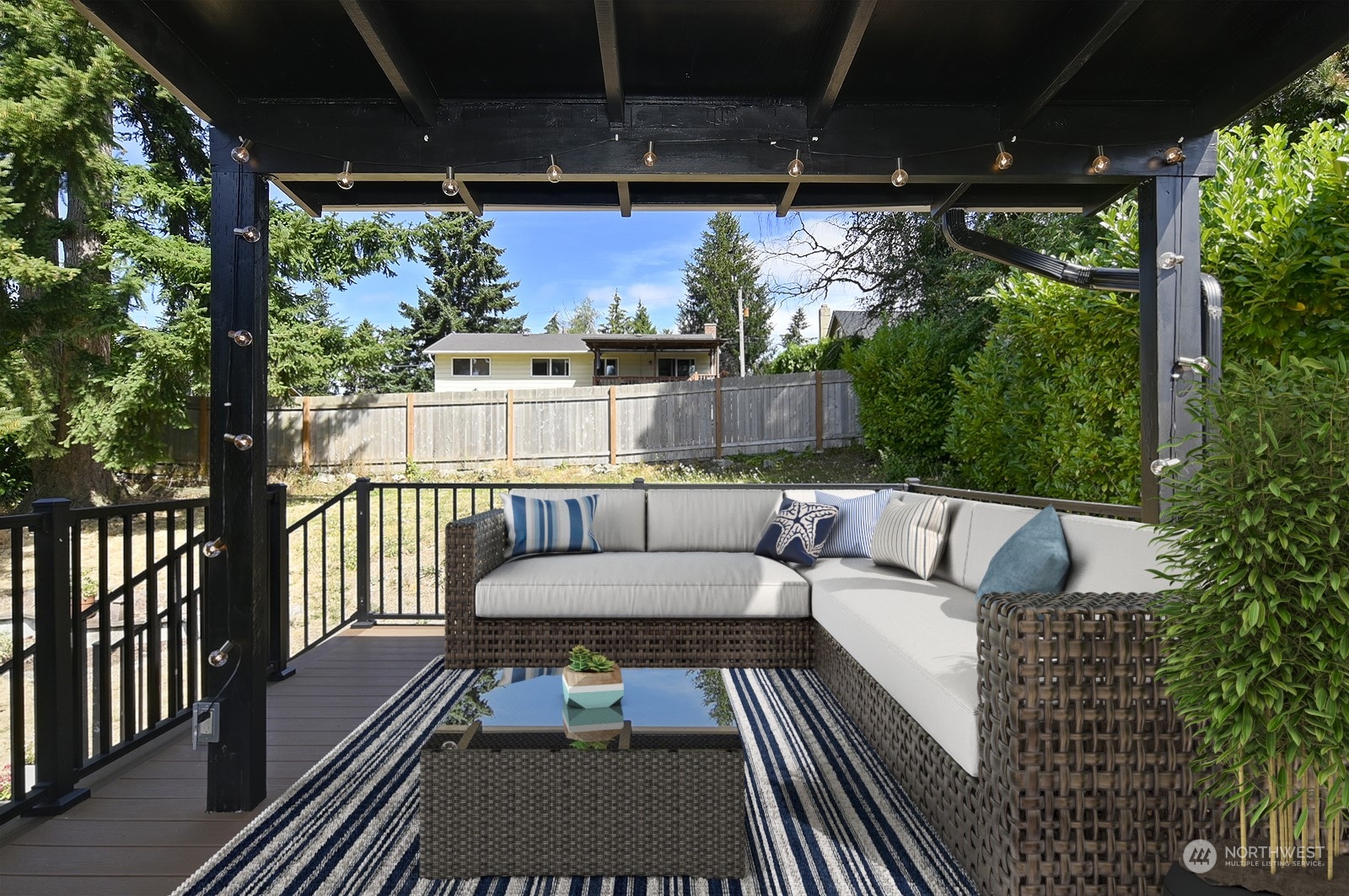 12728 Southeast 163rd Street Renton, WA 98058 - Photo 10 of 40 a view of a balcony with couches and dining table