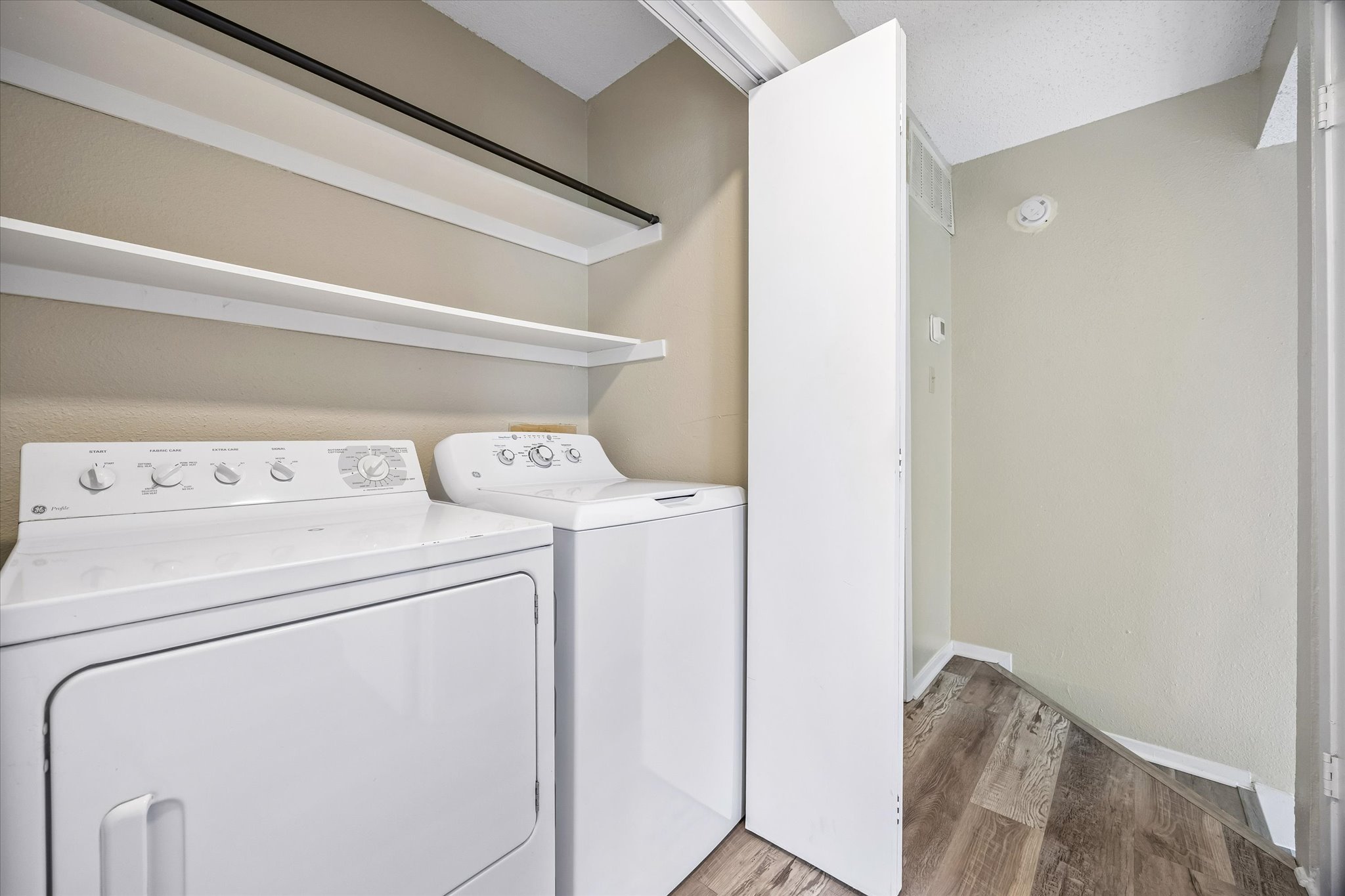 2018 West Rundberg Lane, Unit 13A Austin, TX 78758 - Photo 9 of 11 a utility room with dryer and washer