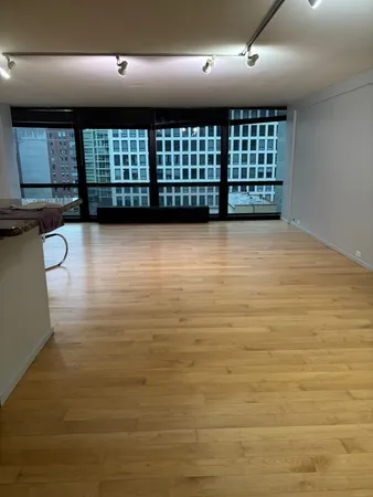 a view of a livingroom with a large window