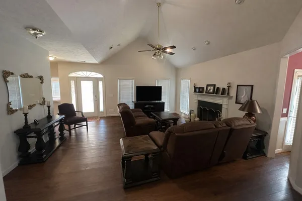 a view of a living room and dining room