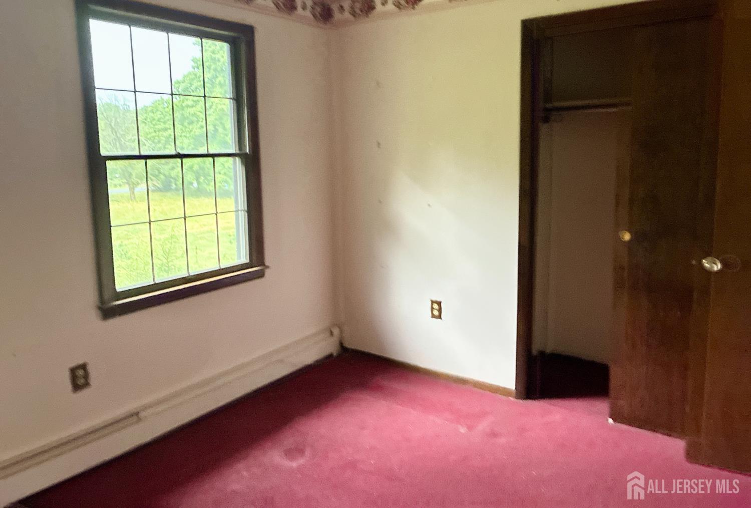 143 Back Brook Road Ringoes, NJ 08551 - Photo 11 of 25 an empty room with a window