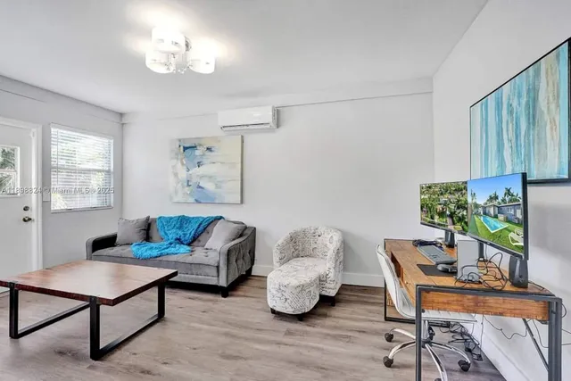 a kitchen with cabinets and stainless steel appliances