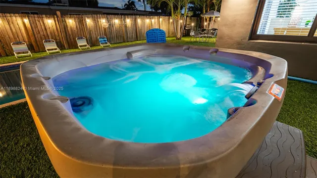 a view of a backyard with a garden and plants