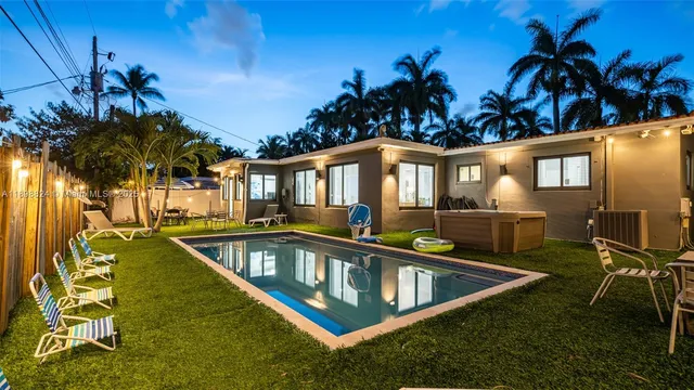 a view of a backyard with palm tree
