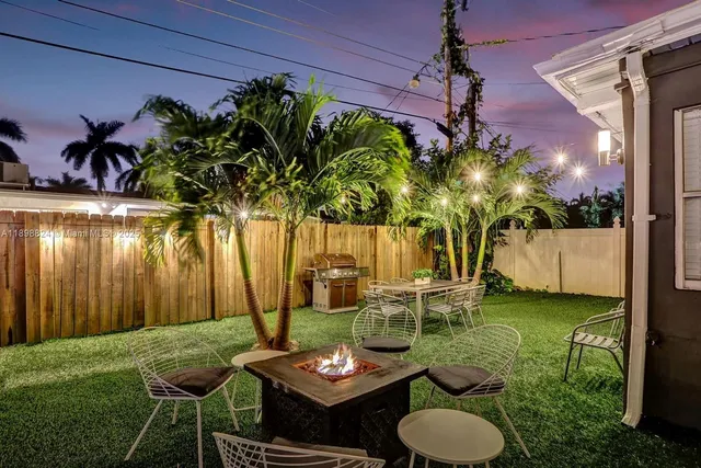 a bed room with a bed and a chair