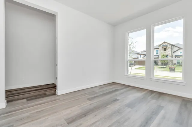 a view of a house with a garden