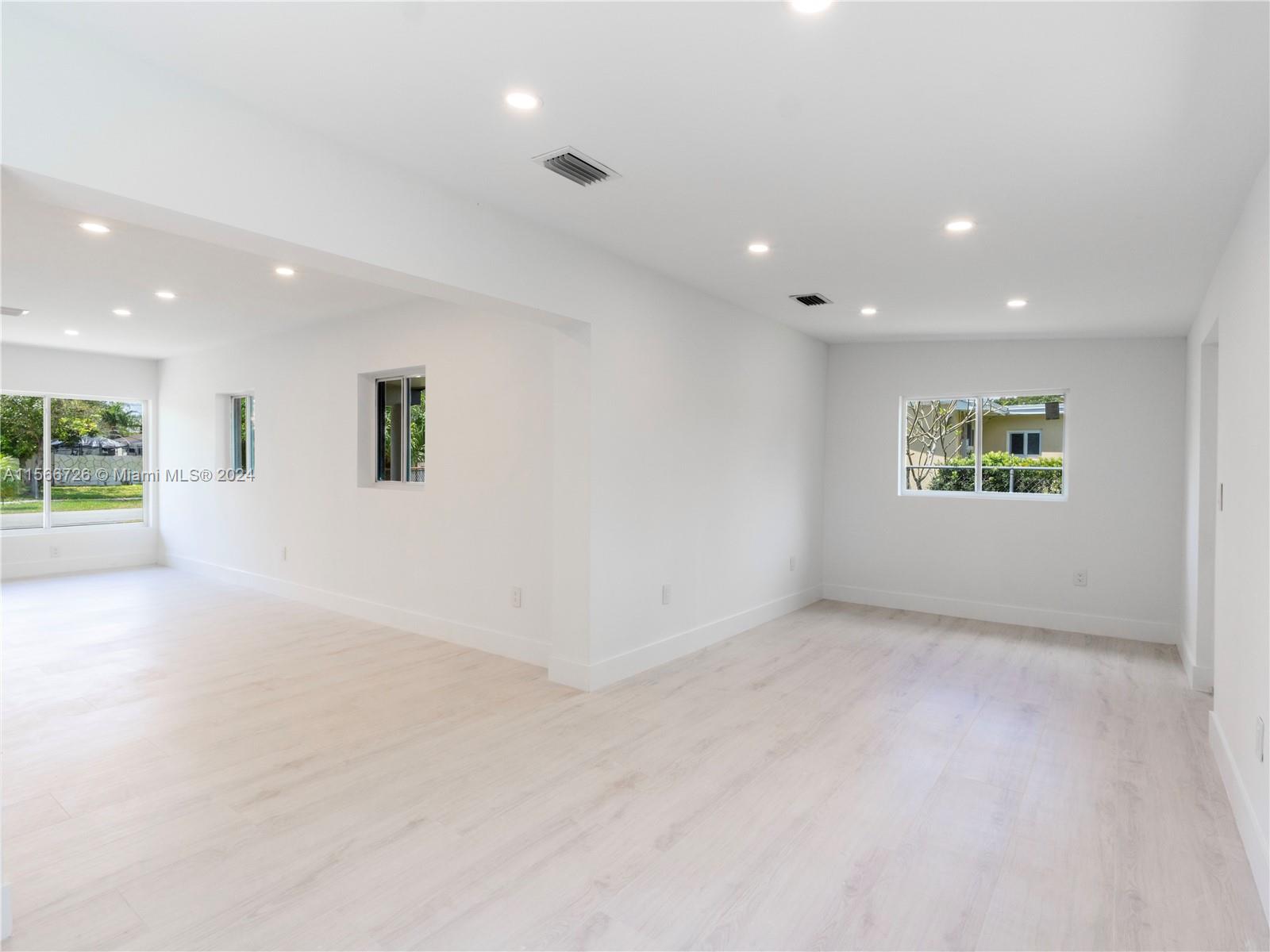 11561 Southwest 187th Street Miami, FL 33157 - Photo 14 of 35 an empty room with a empty space and a window