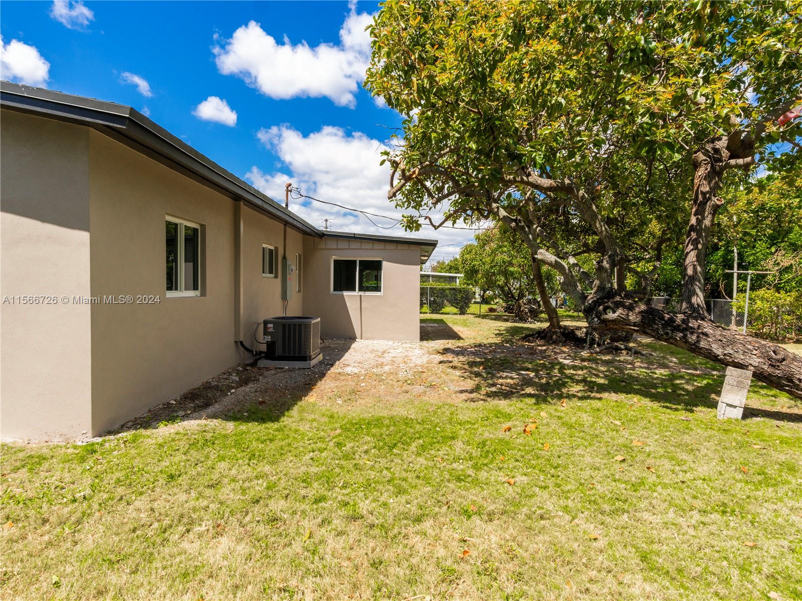 11561 Southwest 187th Street Miami, FL 33157 - Photo 31 of 35 a view of backyard of the house