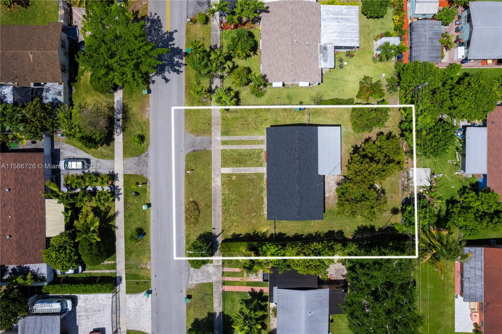 11561 Southwest 187th Street Miami, FL 33157 - Photo 33 of 35 an aerial view of a house with a garden and plants