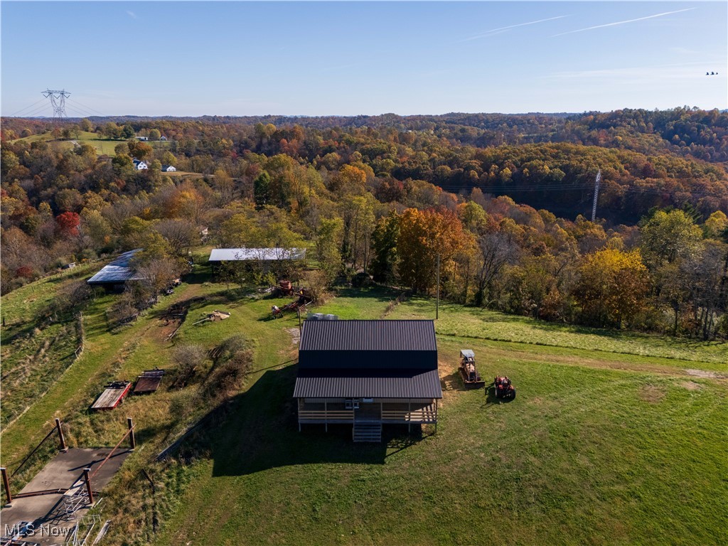 540 Wine Road Elizabeth, WV 26143 - Photo 40 of 49 Drone / aerial view of a heavily wooded area
