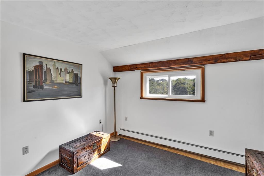 4032 Ewalt Road Gibsonia, PA 15044 - Photo 33 of 40 a room with painting on the wall and a window