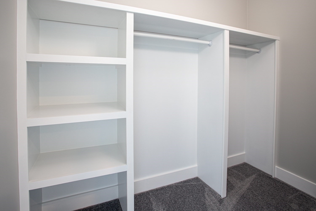 337 Danforth Street, Unit 7 Fall River, MA 02720 - Photo 19 of 28 a view of an empty walk in closet