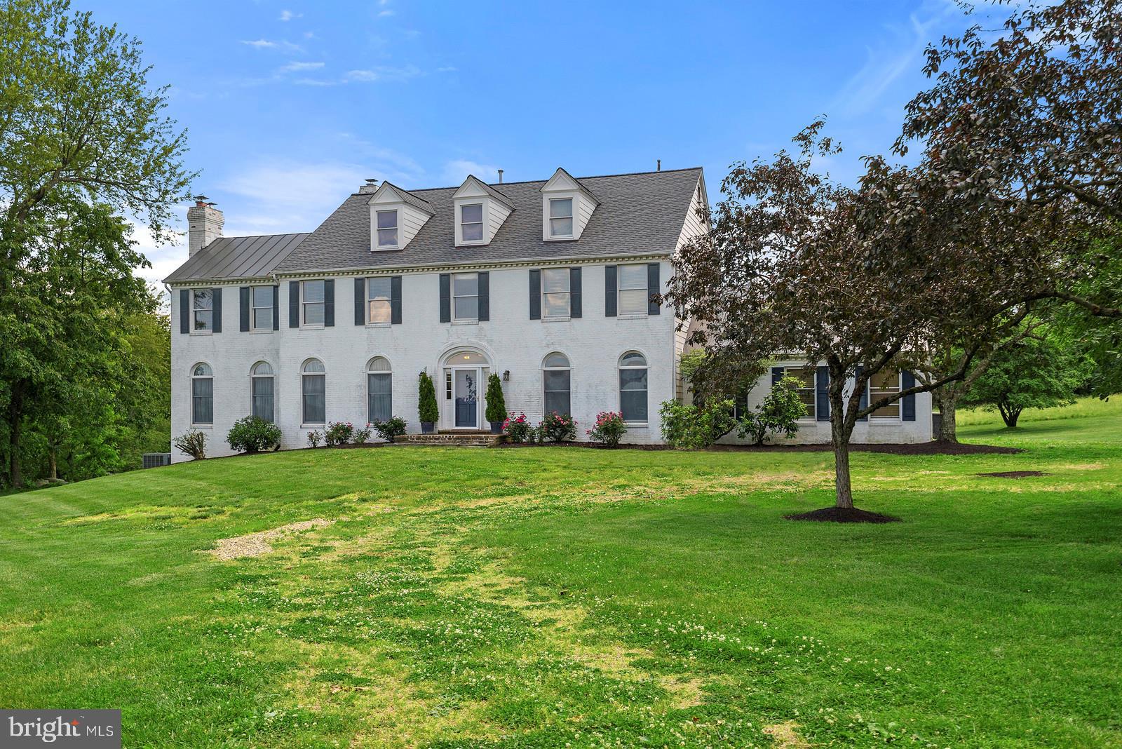 35361 Paxson Road Round Hill, VA 20141 - Photo 1 of 30 Classic brick colonial with a side load garage.
