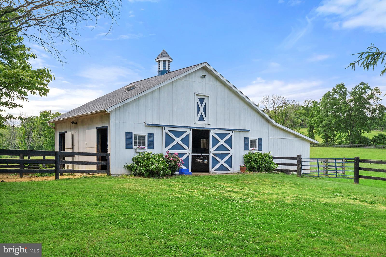 35361 Paxson Road Round Hill, VA 20141 - Photo 2 of 30 Four stall center aisle barn with overhang