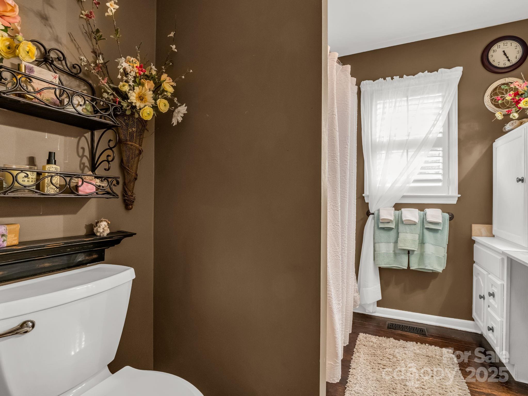 130 Briarwood Drive Rutherfordton, NC 28139 - Photo 18 of 48 a bathroom with a toilet a sink and a shower