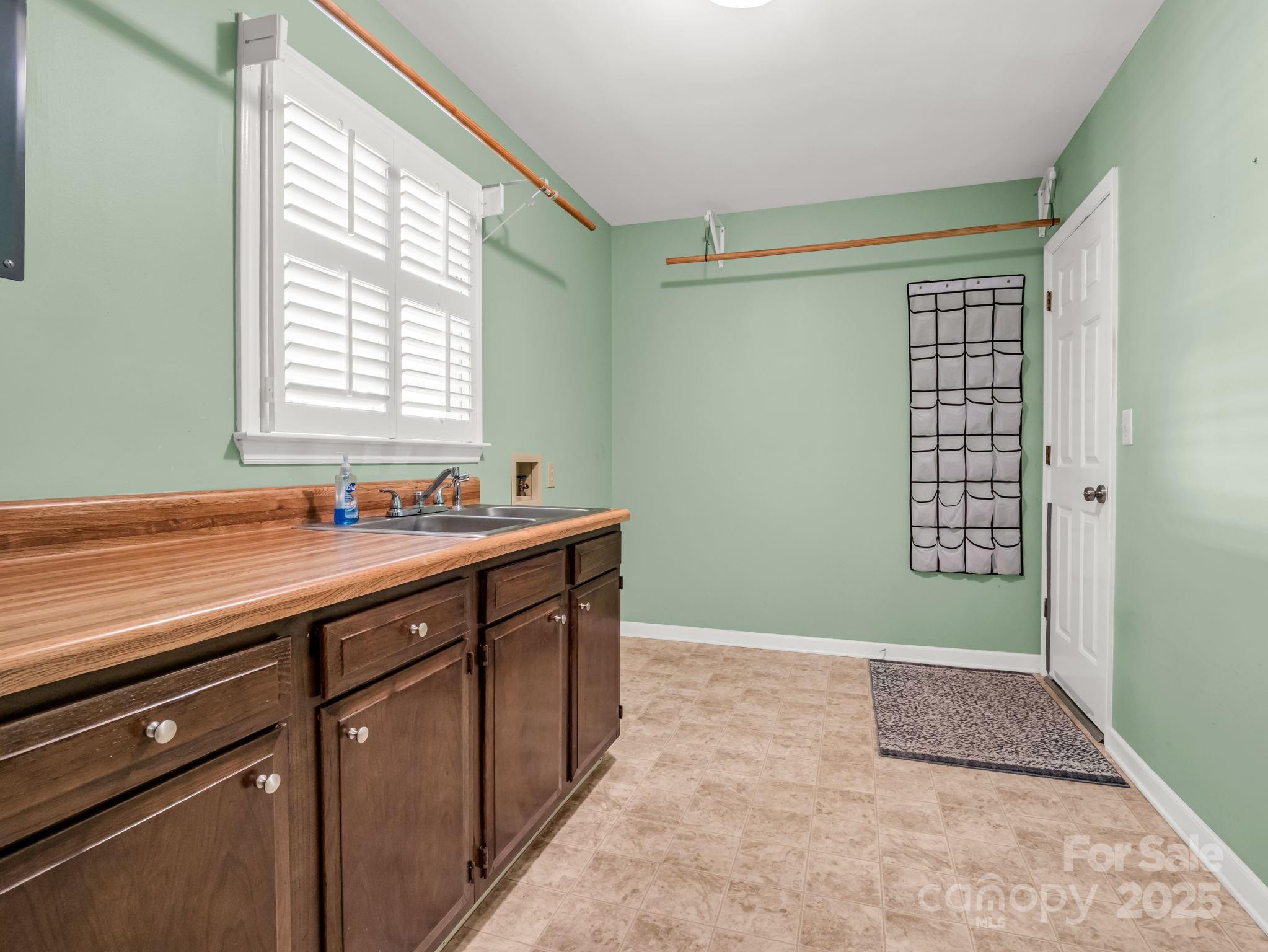 130 Briarwood Drive Rutherfordton, NC 28139 - Photo 19 of 48 a bathroom with a sink and a bathtub