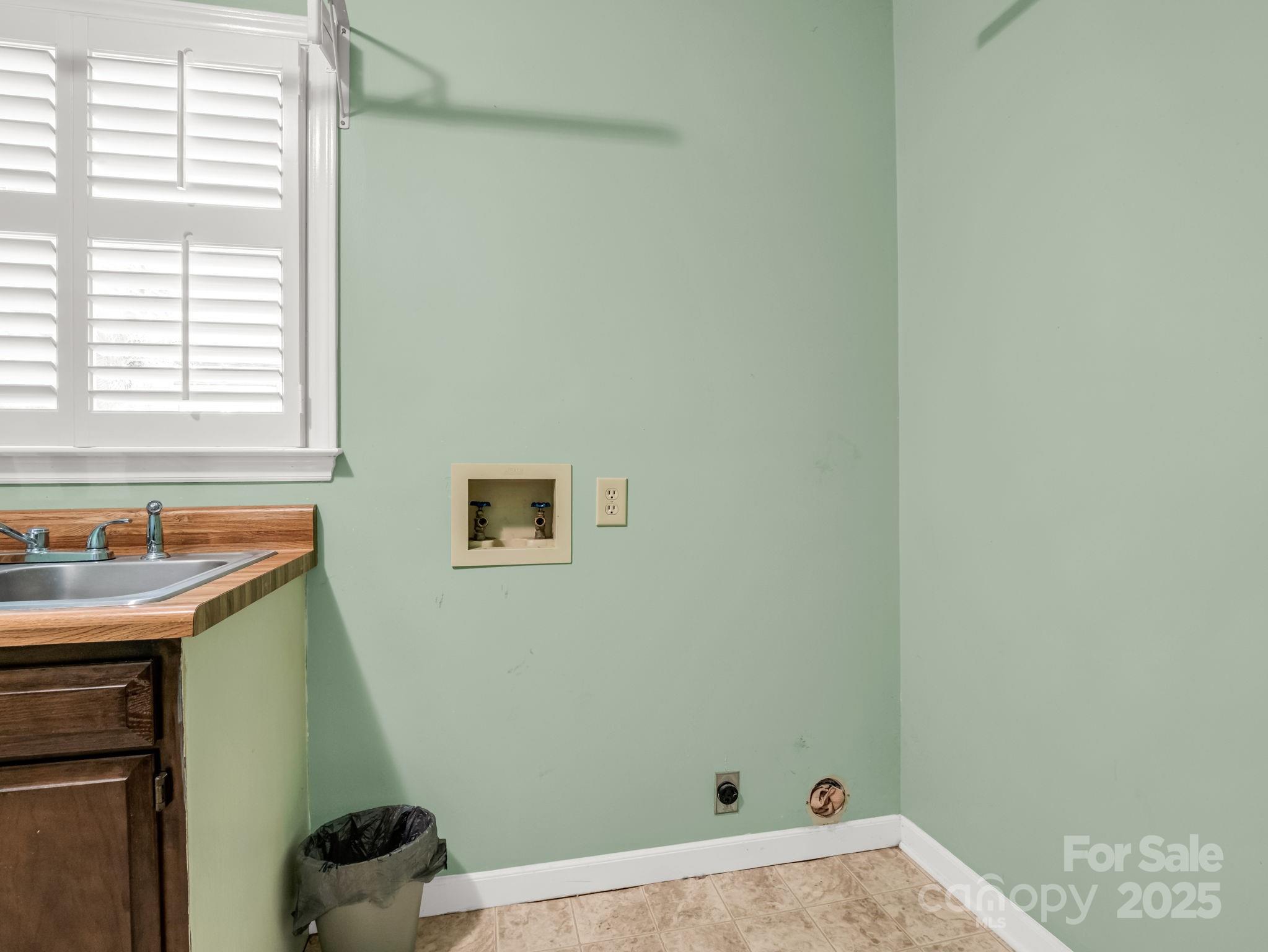 130 Briarwood Drive Rutherfordton, NC 28139 - Photo 20 of 48 a bathroom with a sink and a window