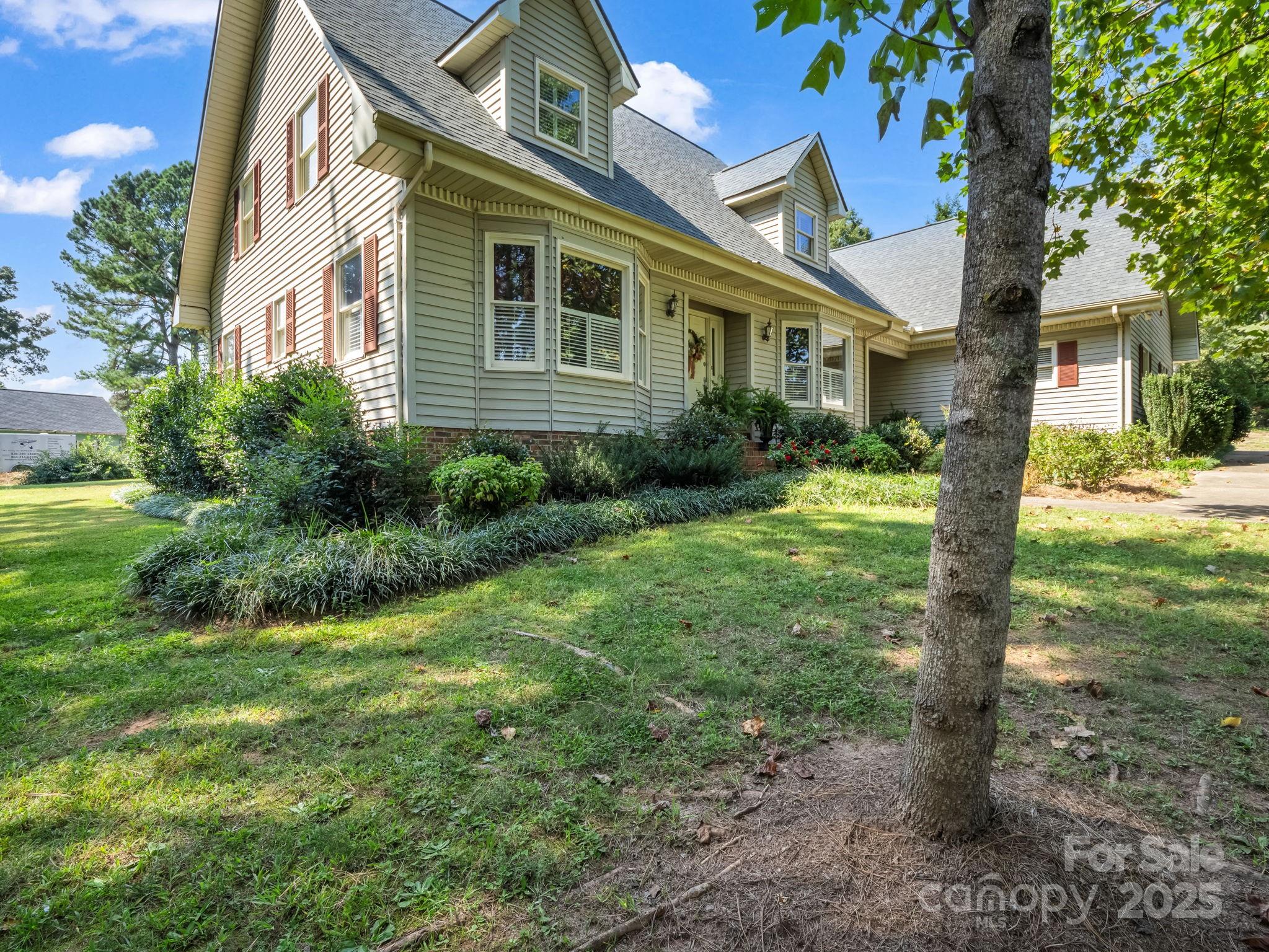 130 Briarwood Drive Rutherfordton, NC 28139 - Photo 2 of 48 a front view of a house with a yard