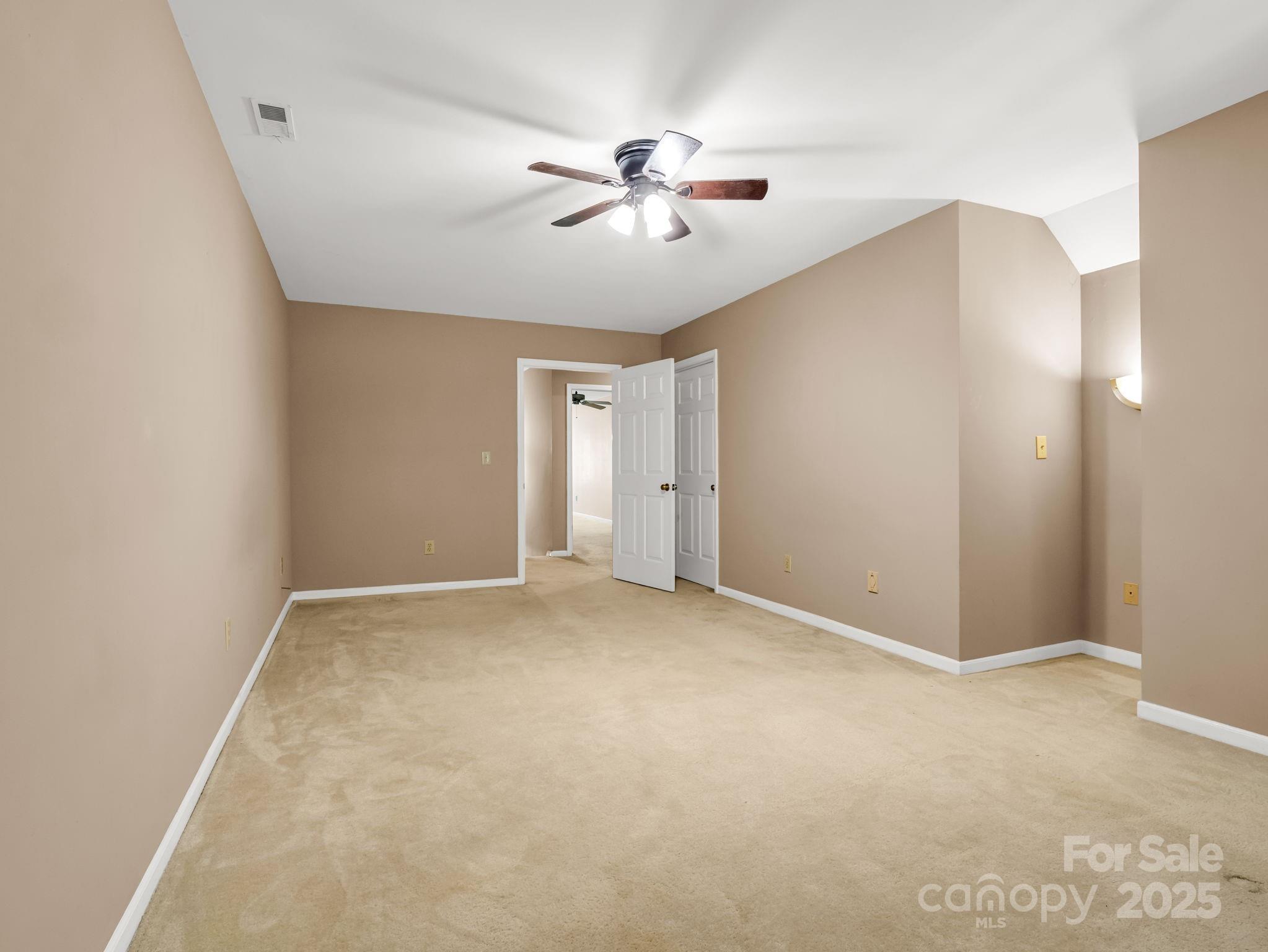 130 Briarwood Drive Rutherfordton, NC 28139 - Photo 24 of 48 a view of an empty room with a ceiling fan