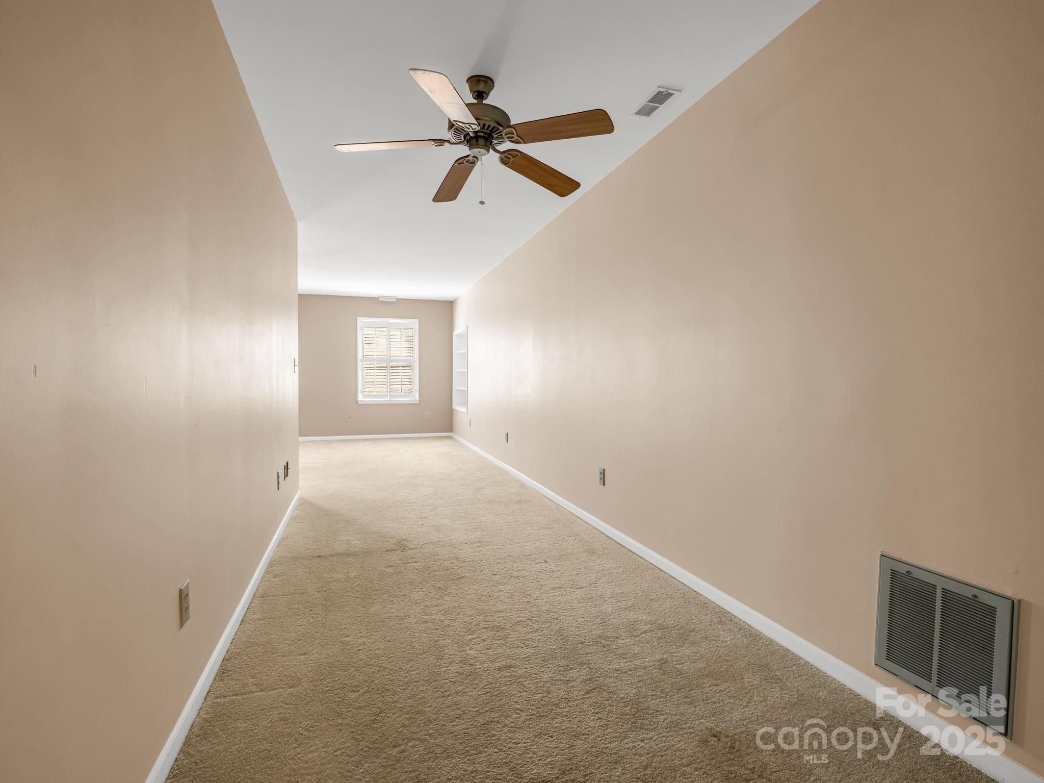 130 Briarwood Drive Rutherfordton, NC 28139 - Photo 27 of 48 a view of a livingroom with a ceiling fan and window