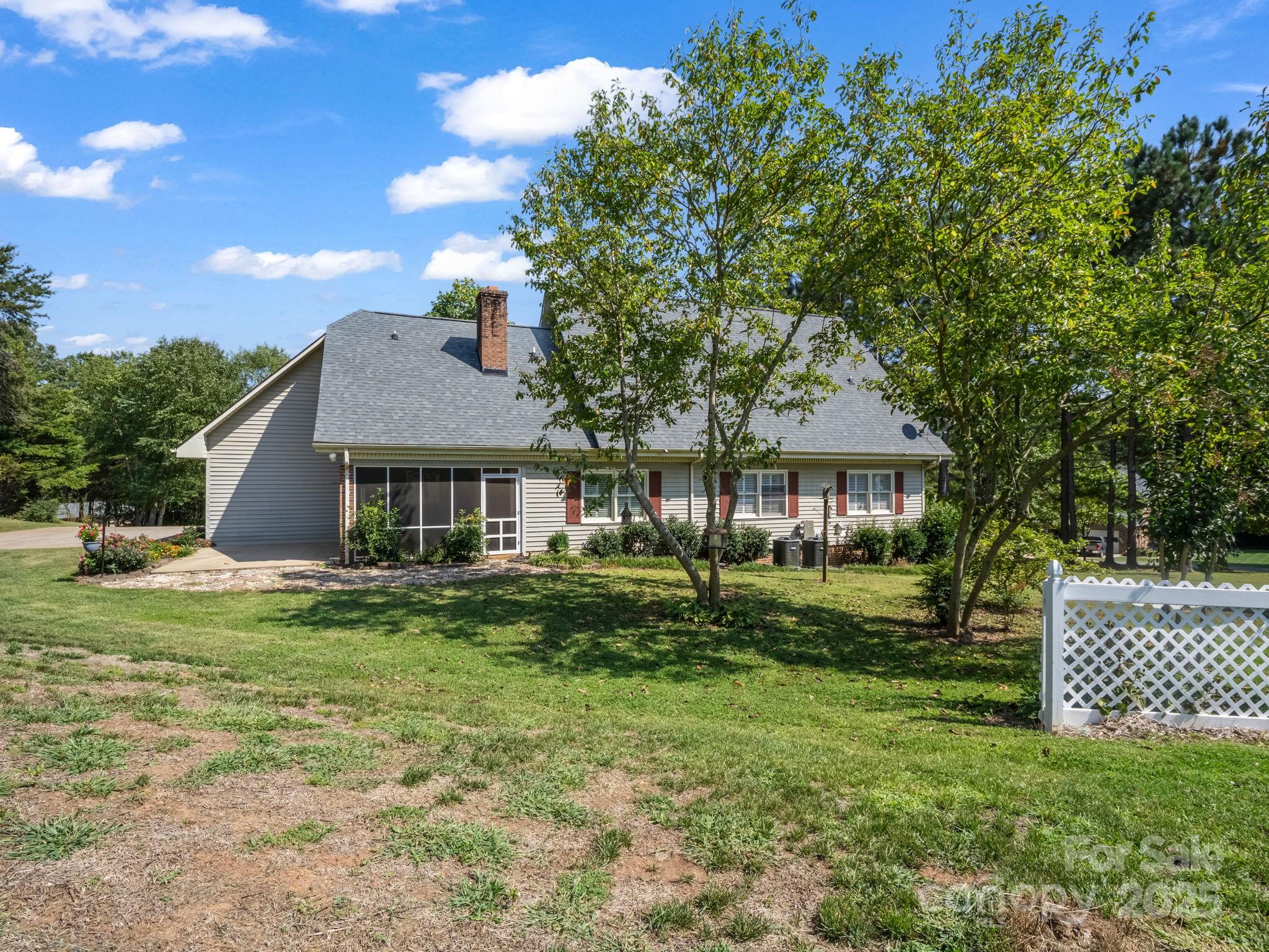 130 Briarwood Drive Rutherfordton, NC 28139 - Photo 35 of 48 a front view of a house with a garden