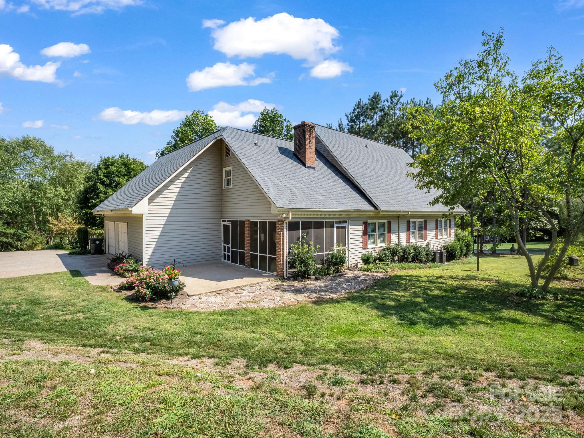 130 Briarwood Drive Rutherfordton, NC 28139 - Photo 36 of 48 a front view of a house with a garden