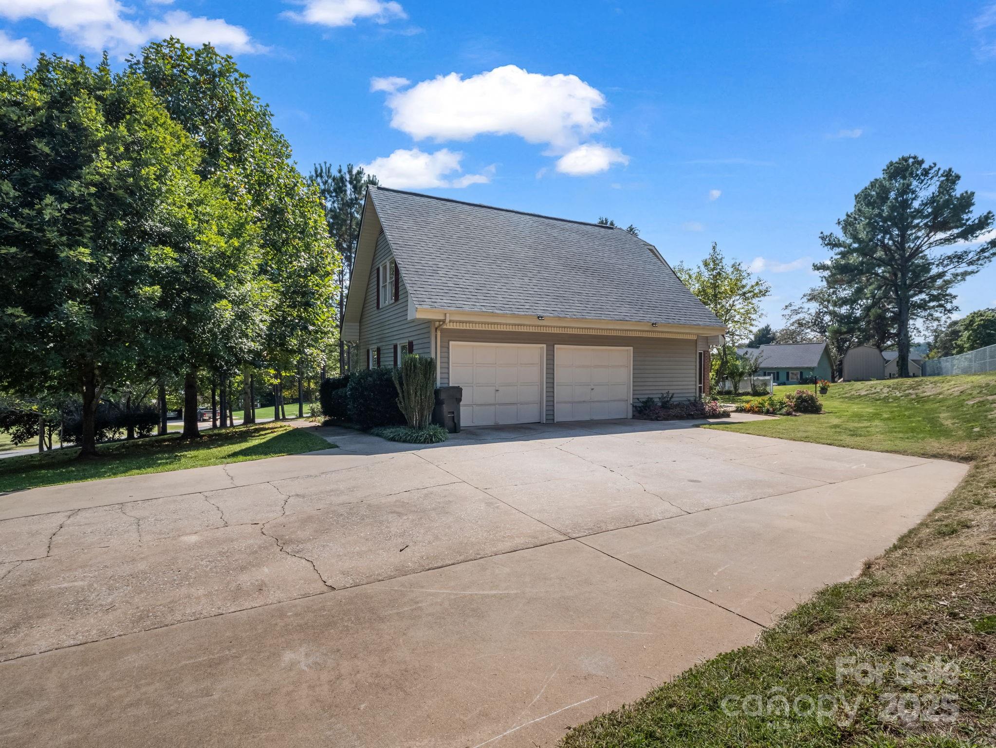 130 Briarwood Drive Rutherfordton, NC 28139 - Photo 38 of 48 a front view of a house with a yard and garage