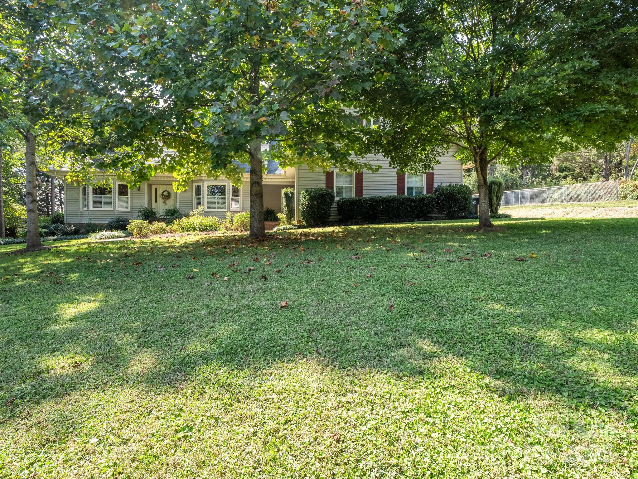 130 Briarwood Drive Rutherfordton, NC 28139 - Photo 40 of 48 a view of a house with a backyard
