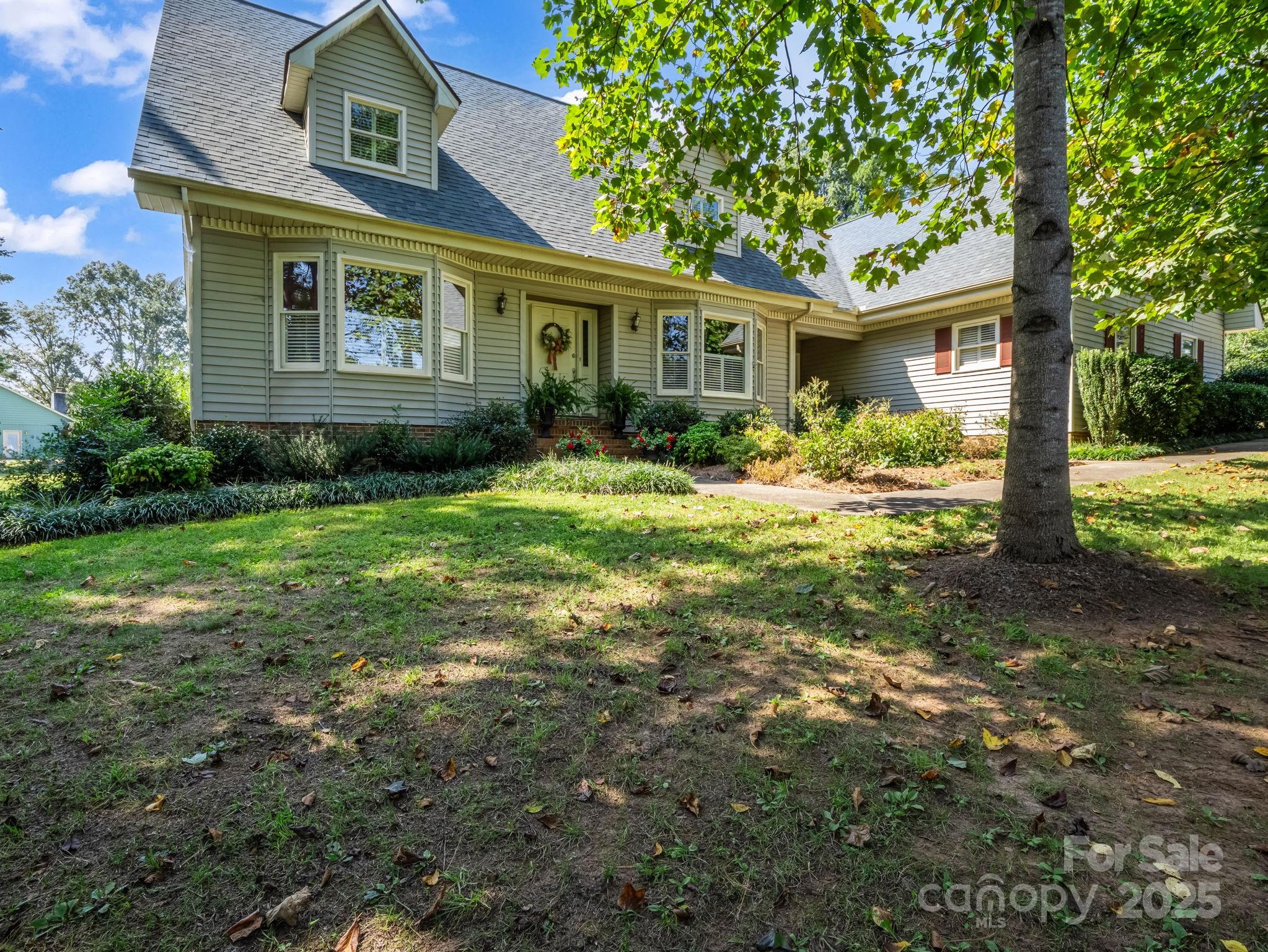 130 Briarwood Drive Rutherfordton, NC 28139 - Photo 4 of 48 a view of a house with backyard and garden