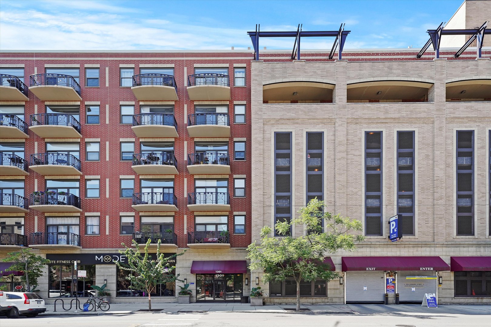 1301 West Madison Street, Unit 629 Chicago, IL 60607 - Photo 1 of 25 a view of a building with a street