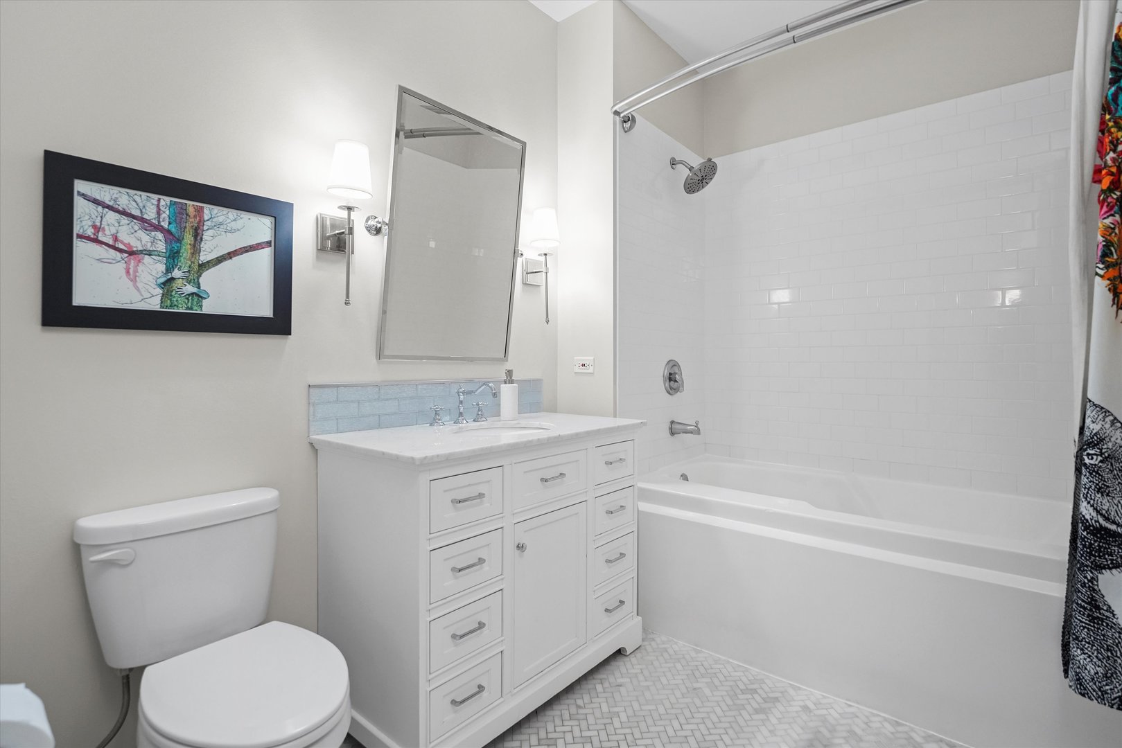 1301 West Madison Street, Unit 629 Chicago, IL 60607 - Photo 12 of 25 a bathroom with a toilet a sink a mirror a shower a vanity and window