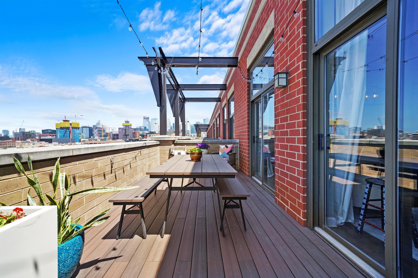 1301 West Madison Street, Unit 629 Chicago, IL 60607 - Photo 17 of 25 a balcony with wooden floor