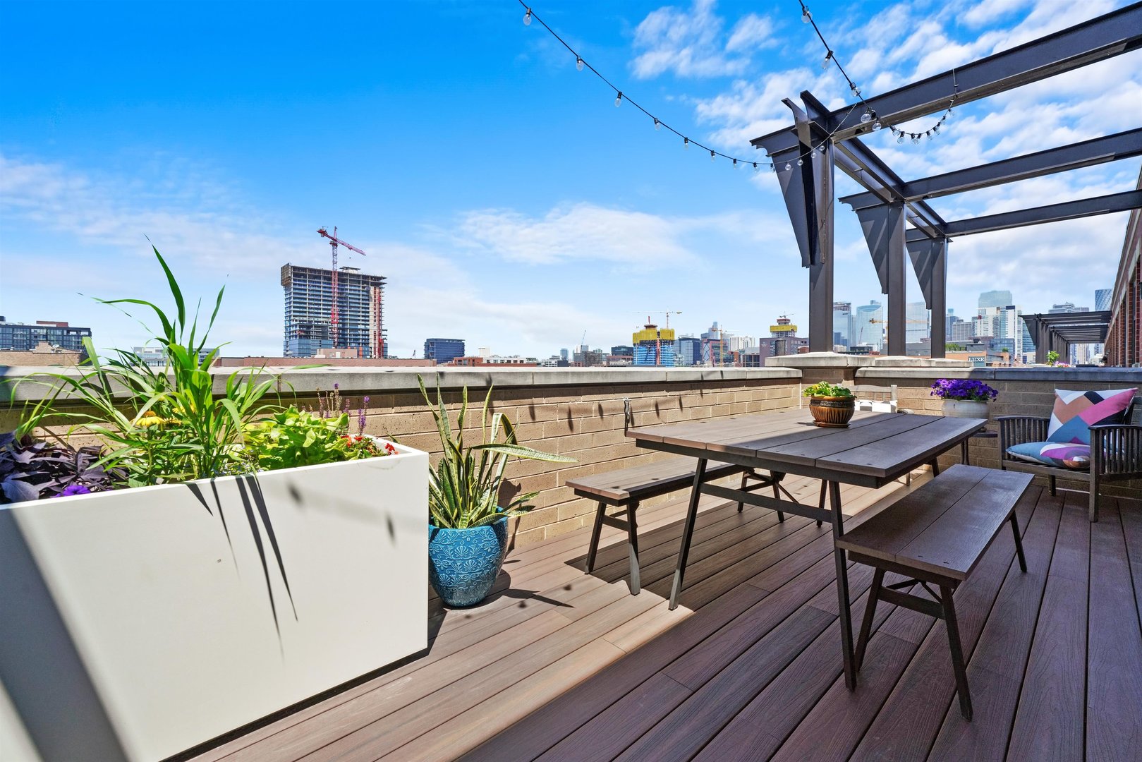 1301 West Madison Street, Unit 629 Chicago, IL 60607 - Photo 19 of 25 a view of a chairs and table in the terrace