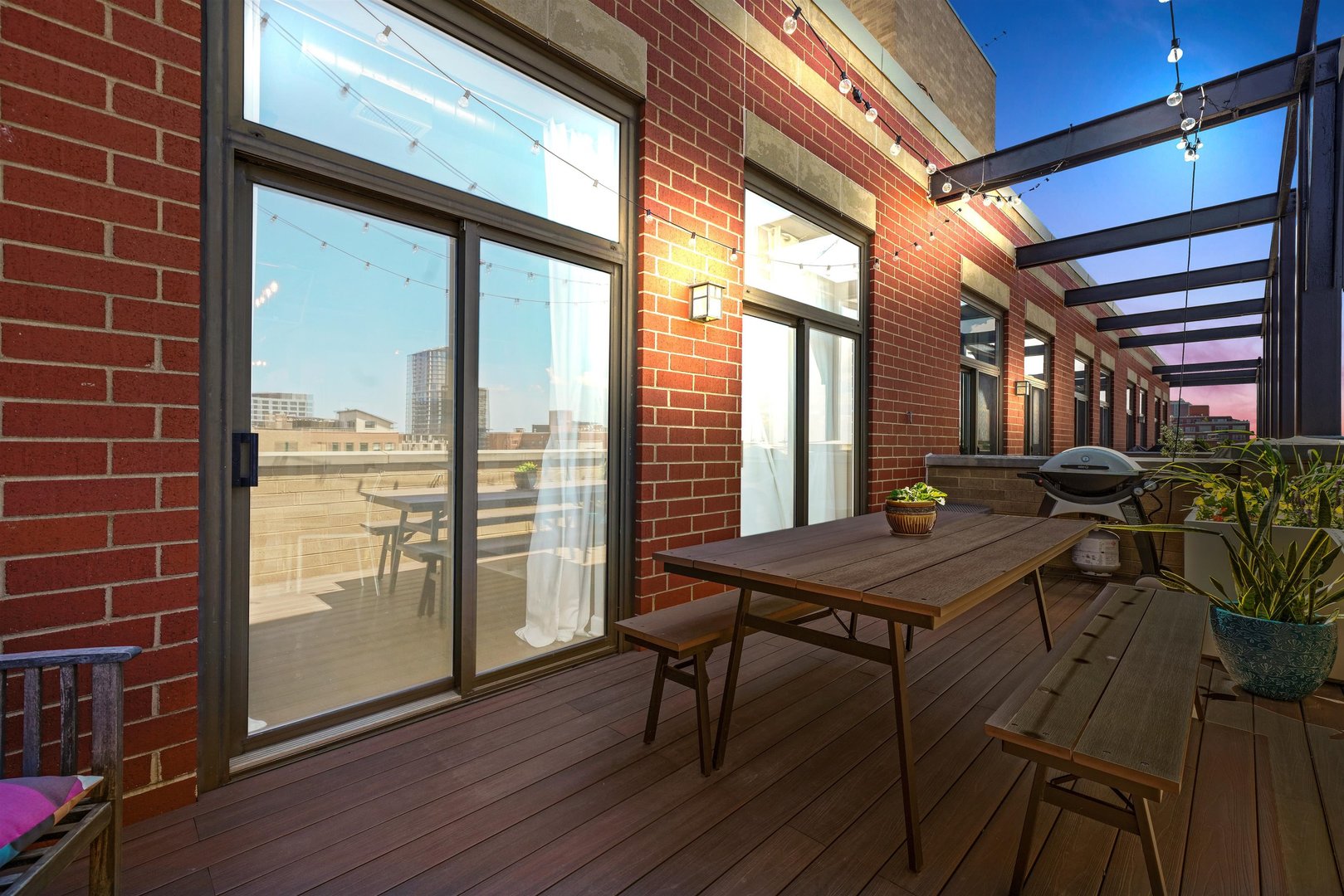 1301 West Madison Street, Unit 629 Chicago, IL 60607 - Photo 20 of 25 a view of a room with furniture and wooden floor