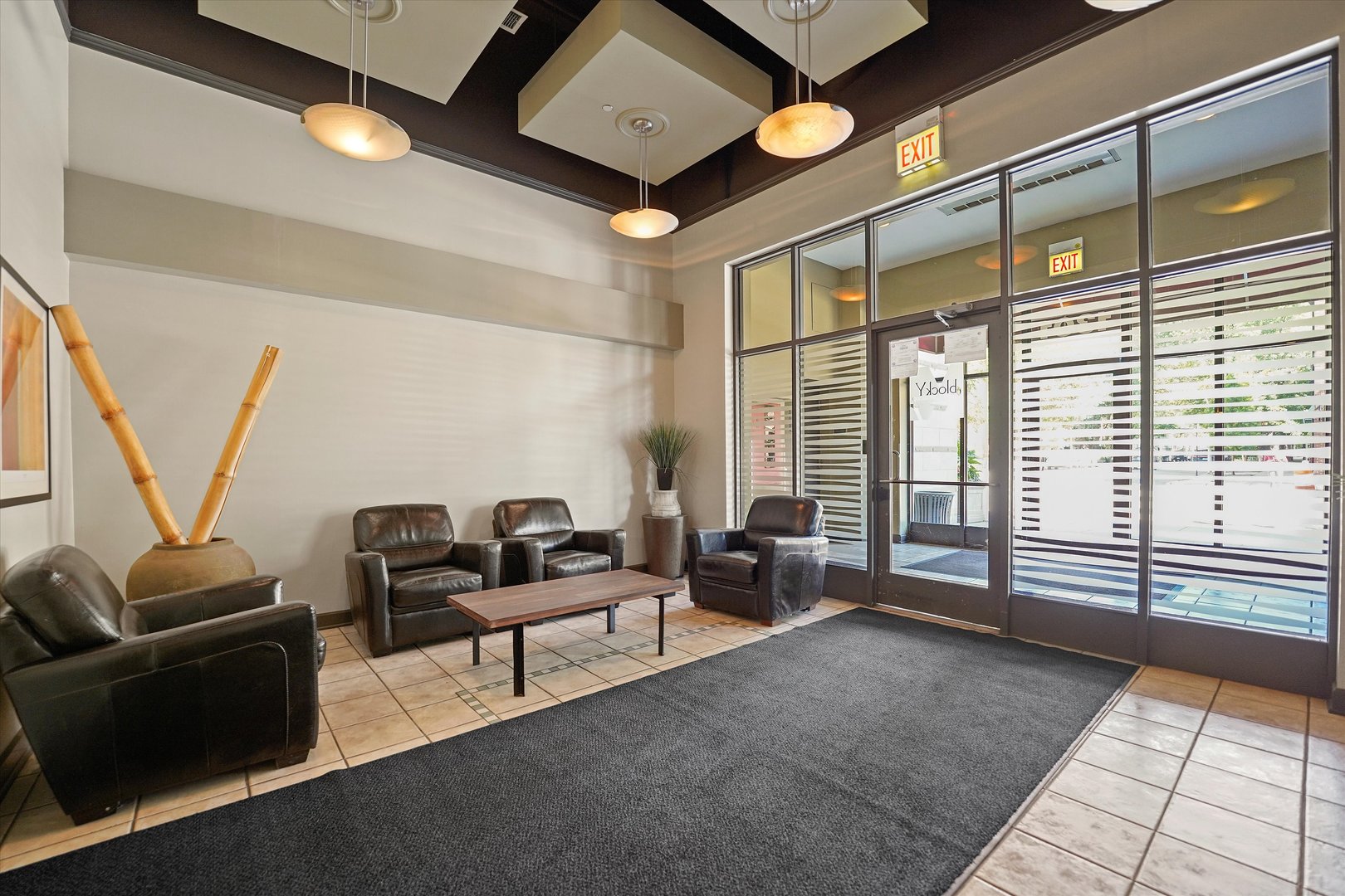 1301 West Madison Street, Unit 629 Chicago, IL 60607 - Photo 21 of 25 a living room with furniture and a floor to ceiling window