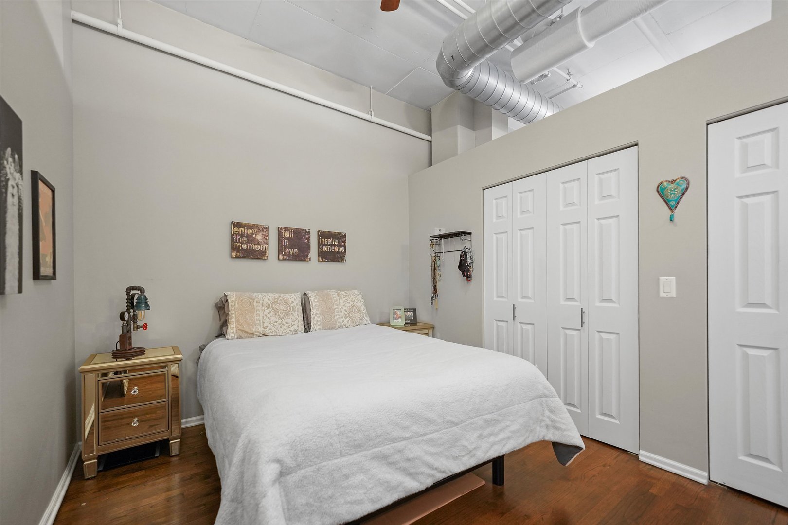 1301 West Madison Street, Unit 629 Chicago, IL 60607 - Photo 10 of 25 a bedroom with a bed and a closet
